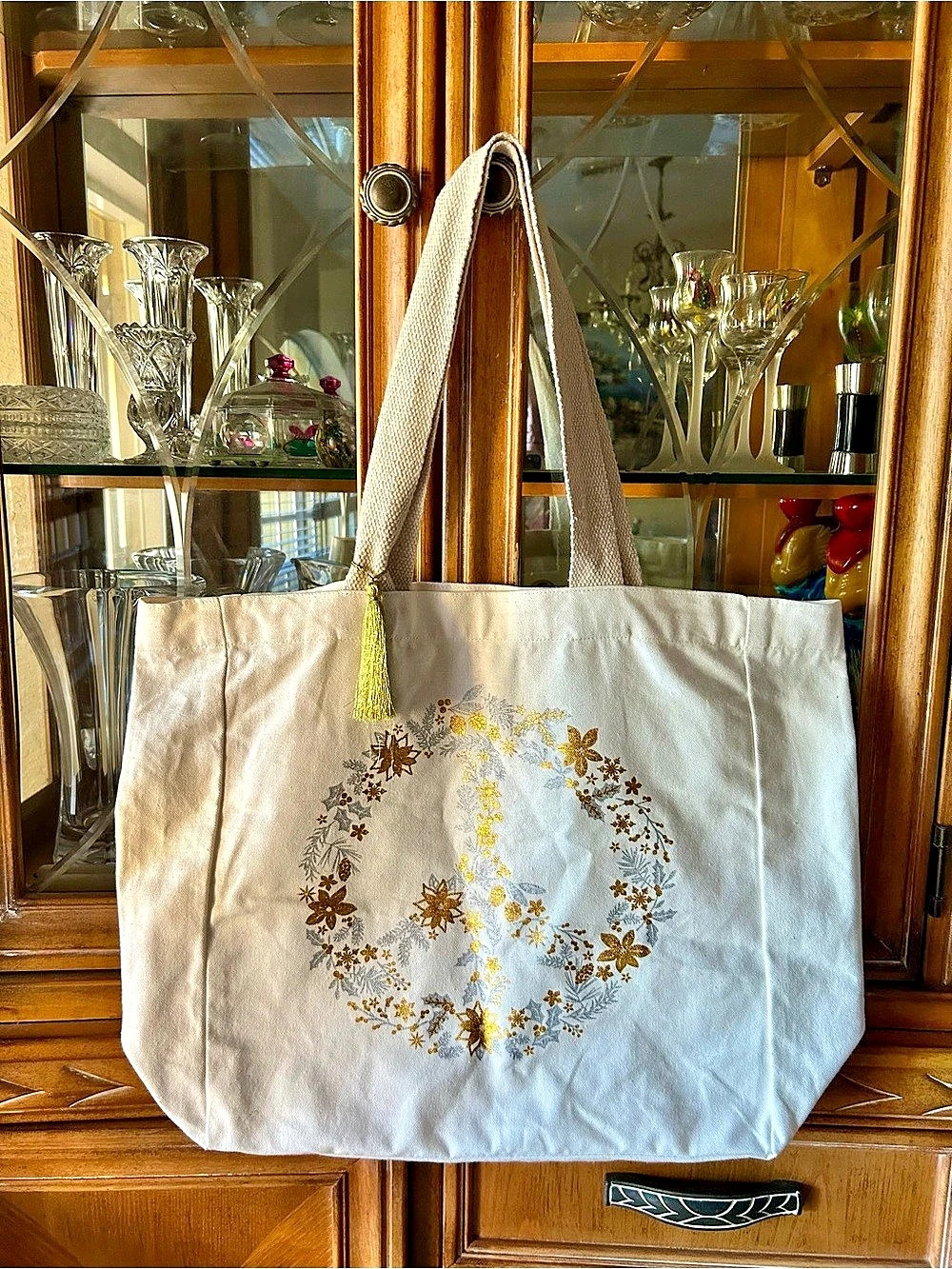 Cotton Tote with gold peace sign.Like New.